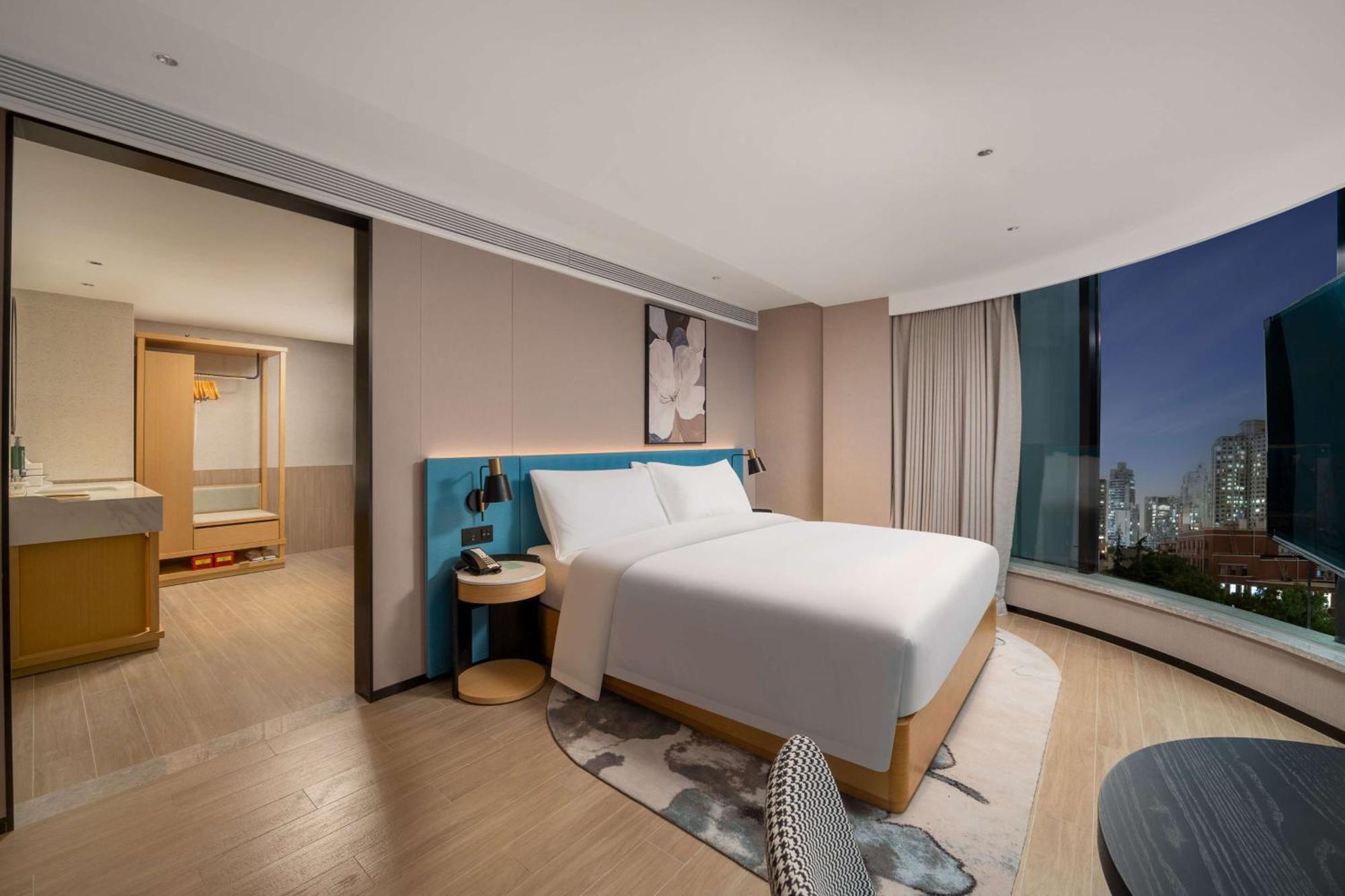 Hilton Garden Caoyang 4*